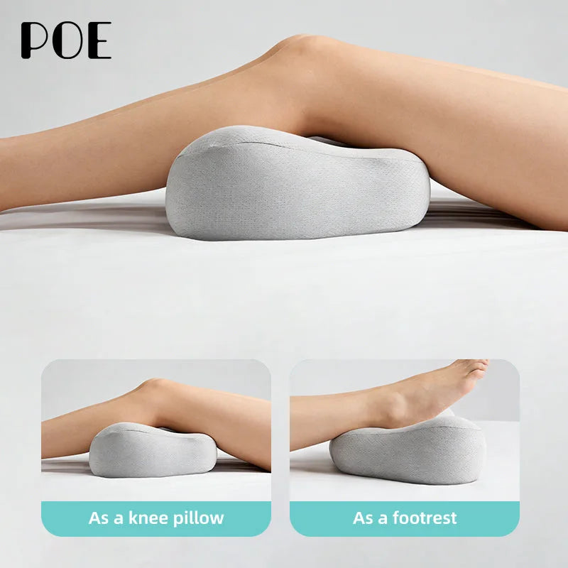 The knee pillow under a leg, used as a knee pillow and as a footrest