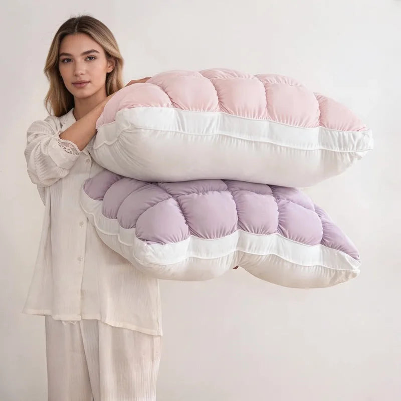 A woman holding two Puff Pillows, one pink and one purple
